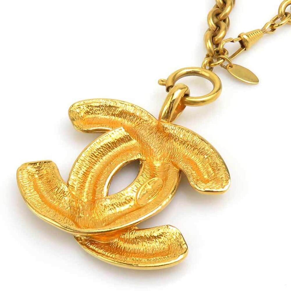 CHANEL Gold Logo Necklace - Picture 4 of 11